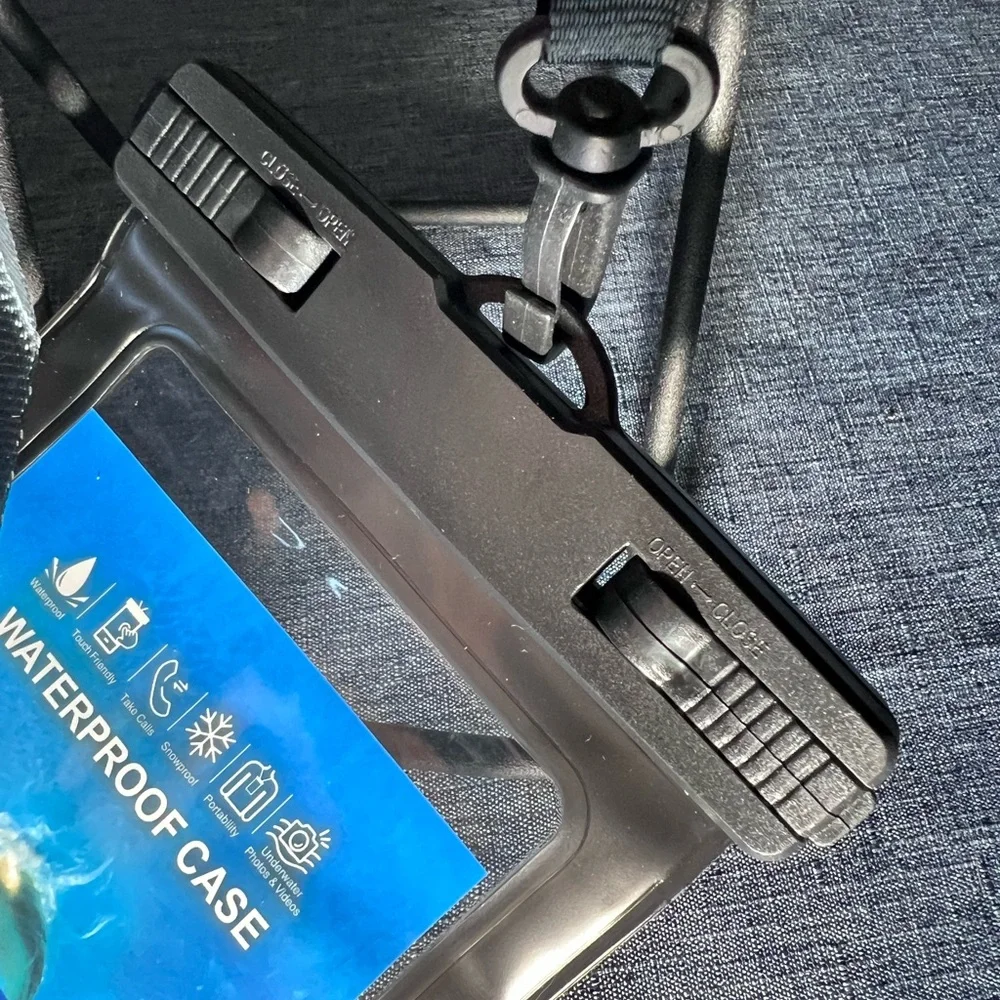 PHONE CASE Waterproof with Strap NWOT. Black and clear.